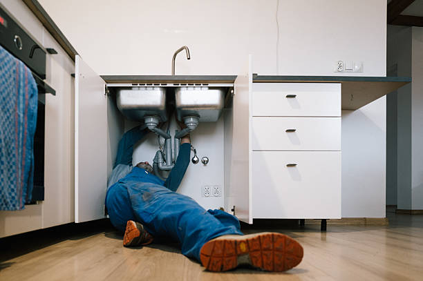 Professional Drain Cleaning technician working in Walls, MS
